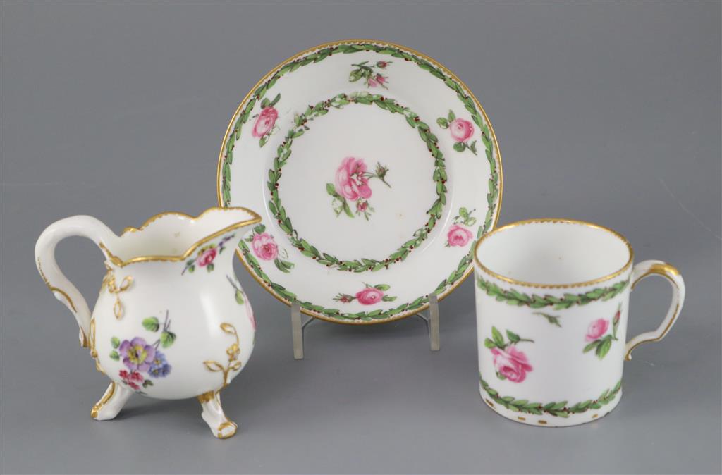 A Sevres cream jug, c.1768, and a Sevres hard paste coffee can and saucer, c.1781, (3)
